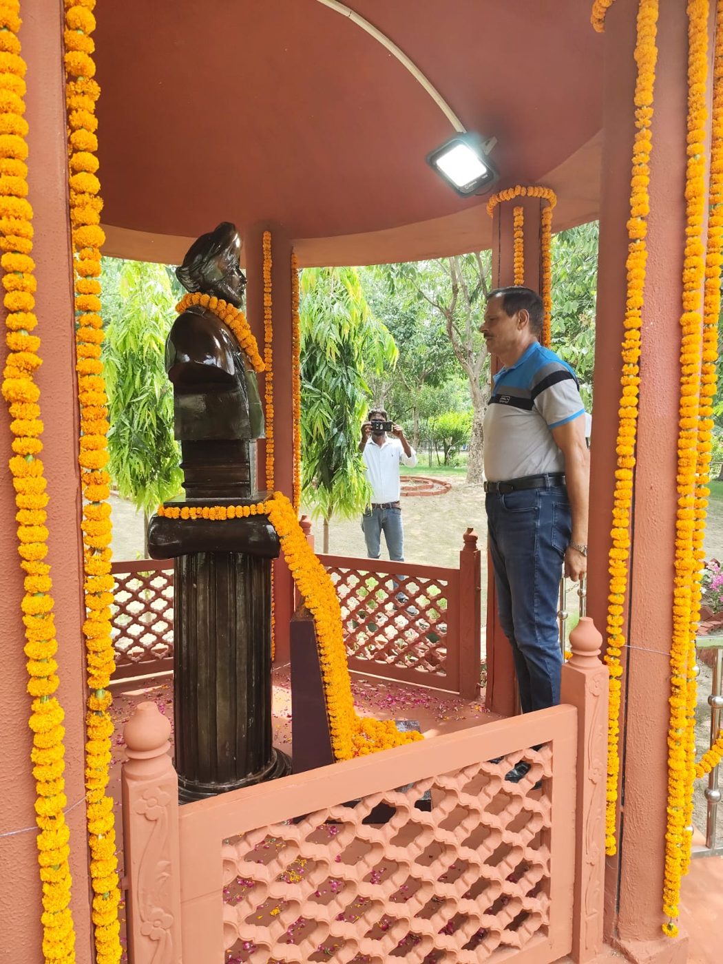 Residents gather at the memorial pavilion